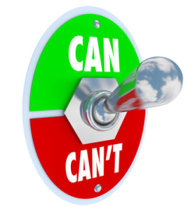 A metal toggle switch flipped up into the position of Can as opposed to the negative attitude Can't to represent commitment and dedication in believing in yourself to solve a problem